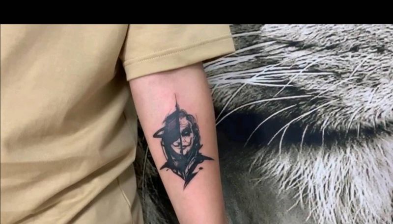 暗黑小丑纹身图片_手臂欧美写实纹身图案