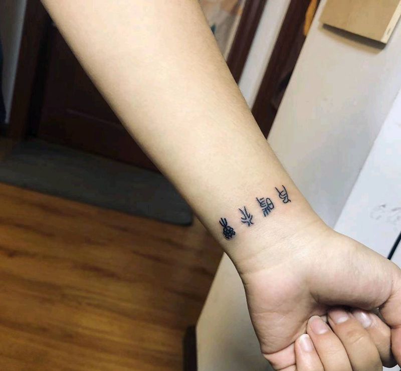 小篆纹身图片_手臂字体纹身图案