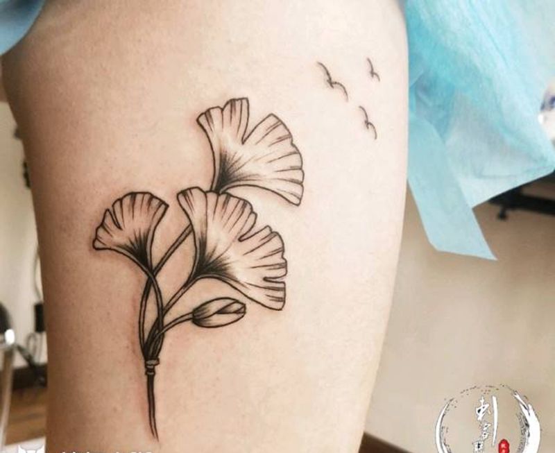 植物纹身图片_腿部点刺纹身图案