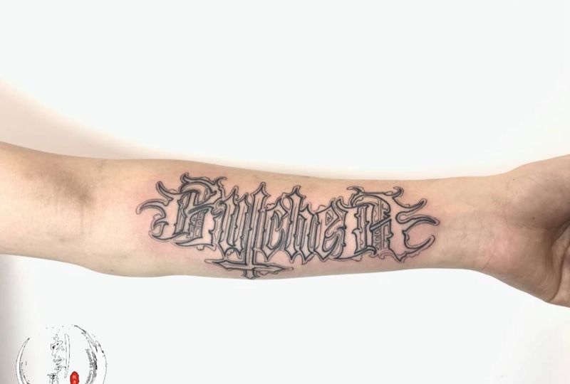 奇卡诺纹身图片_手臂花体字纹身图案