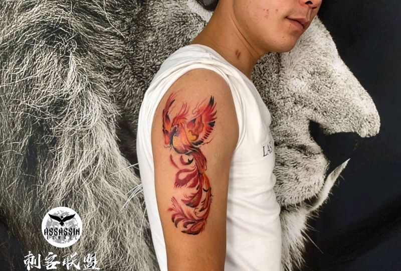 不死鸟纹身图片_手臂动物纹身图案