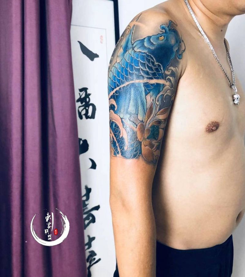 鱼（遮盖）纹身图片_手臂遮盖纹身图案