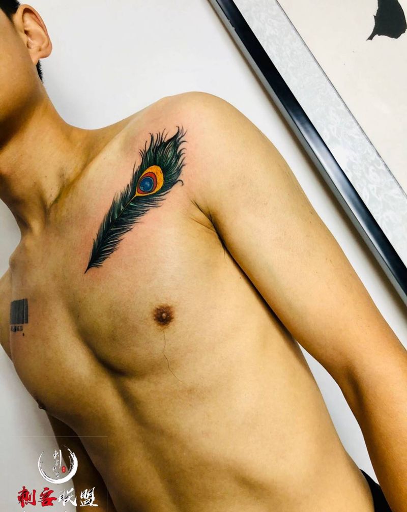 羽毛纹身图片_肩部胸部遮盖纹身图案