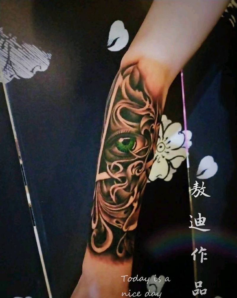 上帝之眼纹身图片_手臂欧美写实纹身图案