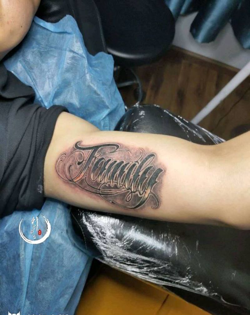 花体字纹身图片_手臂英文纹身图案