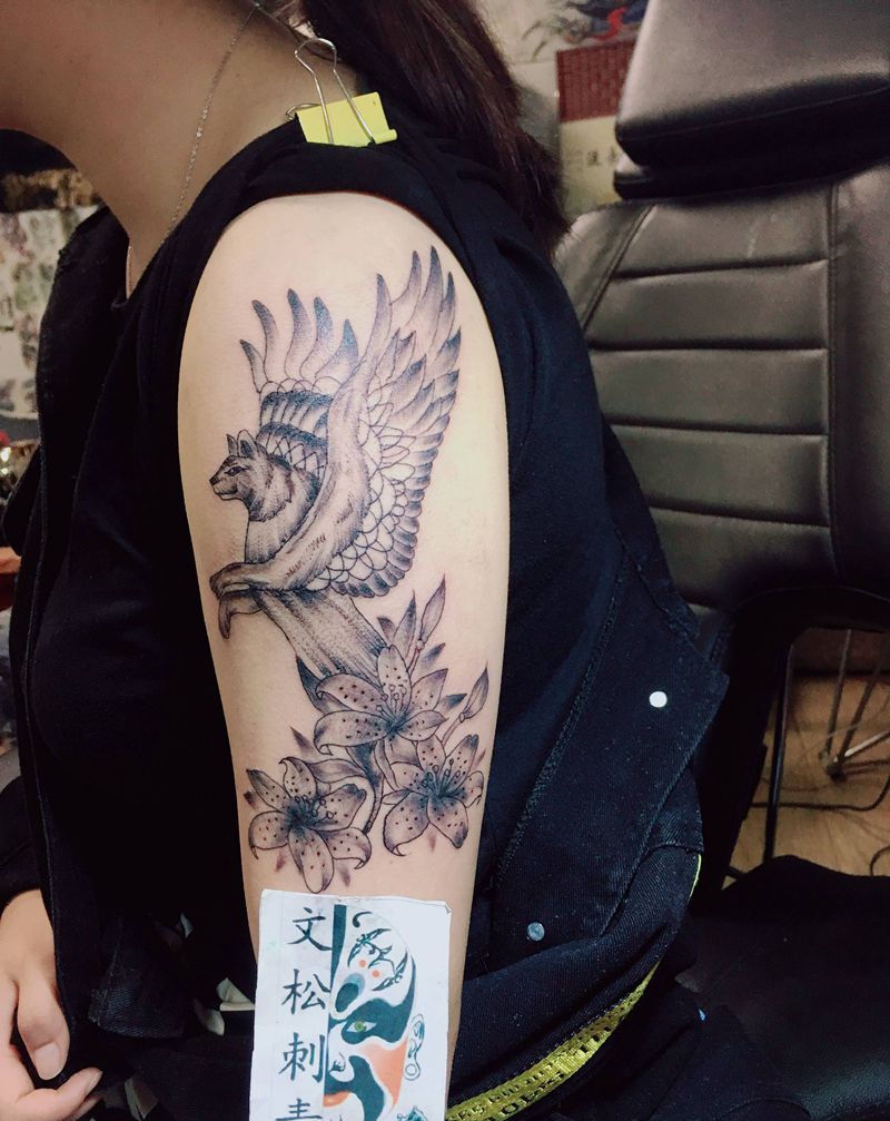 呵呵纹身图片_手臂纹身图案