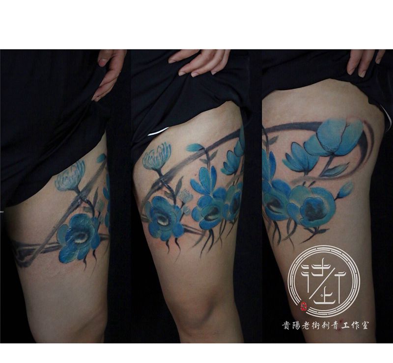 水墨花遮盖纹身图片_腿部水彩水墨花纹身图案