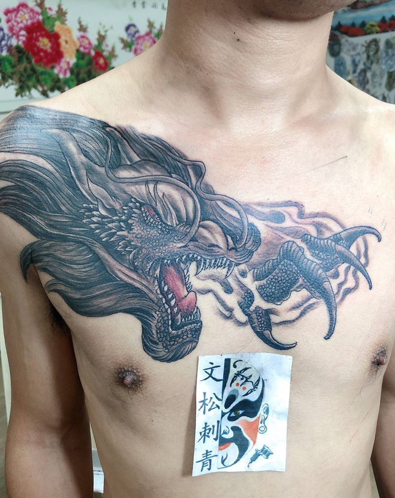 龙头过肩，财路无边纹身图片_胸部纹身图案