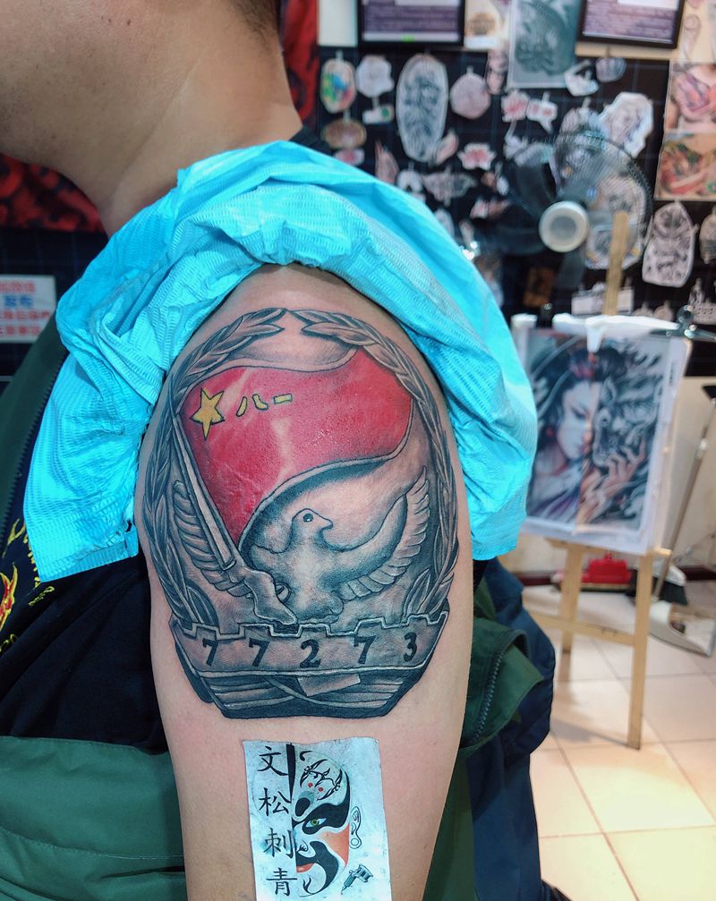 国旗遮盖纹身图片_手臂纹身图案