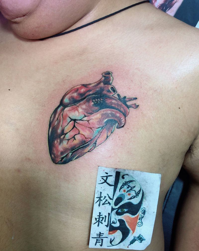 心脏，夜光纹身图片_胸部纹身图案