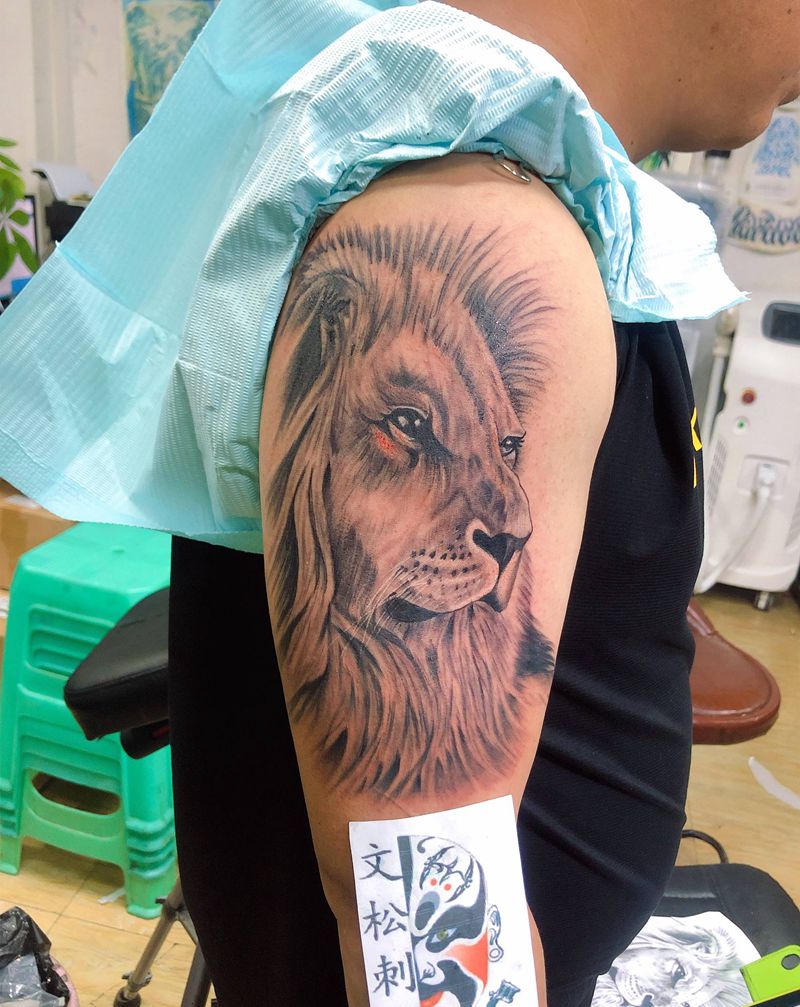 狮纹身图片_手臂纹身图案