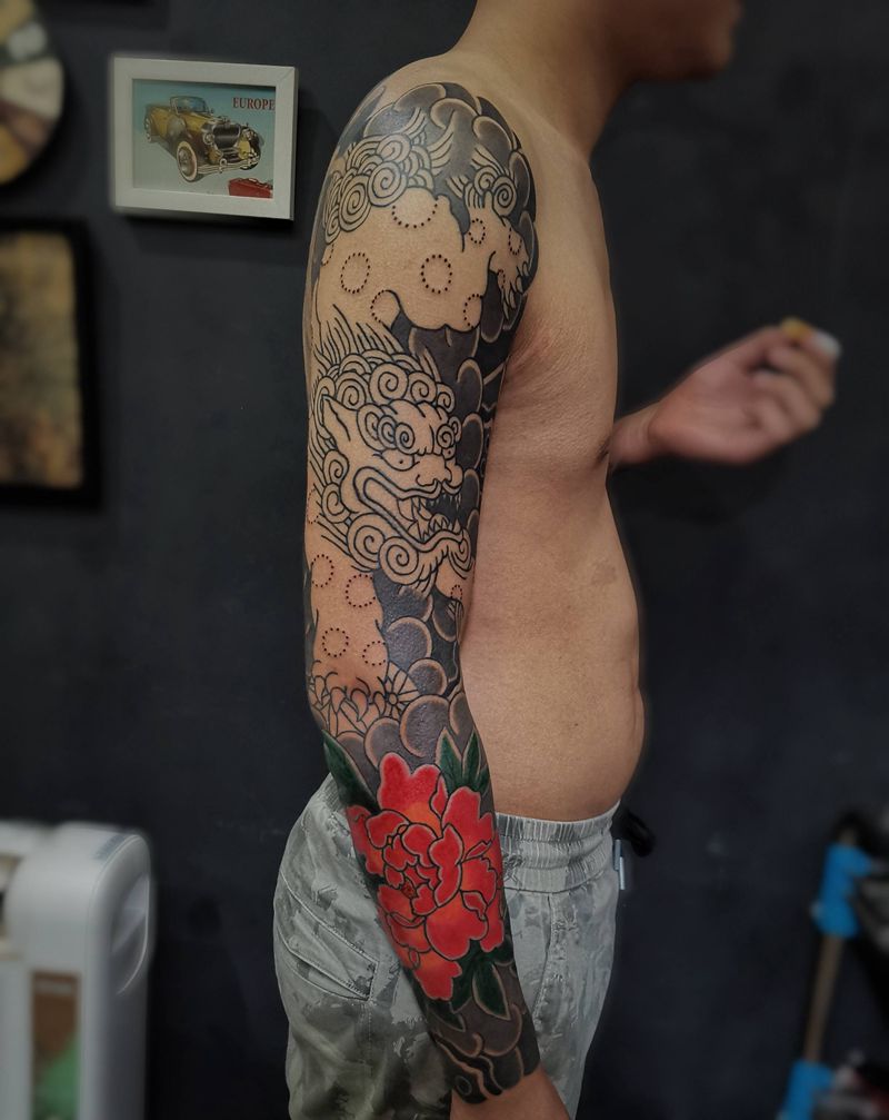 老传统唐狮花臂未完成纹身图片_老传统纹身图案