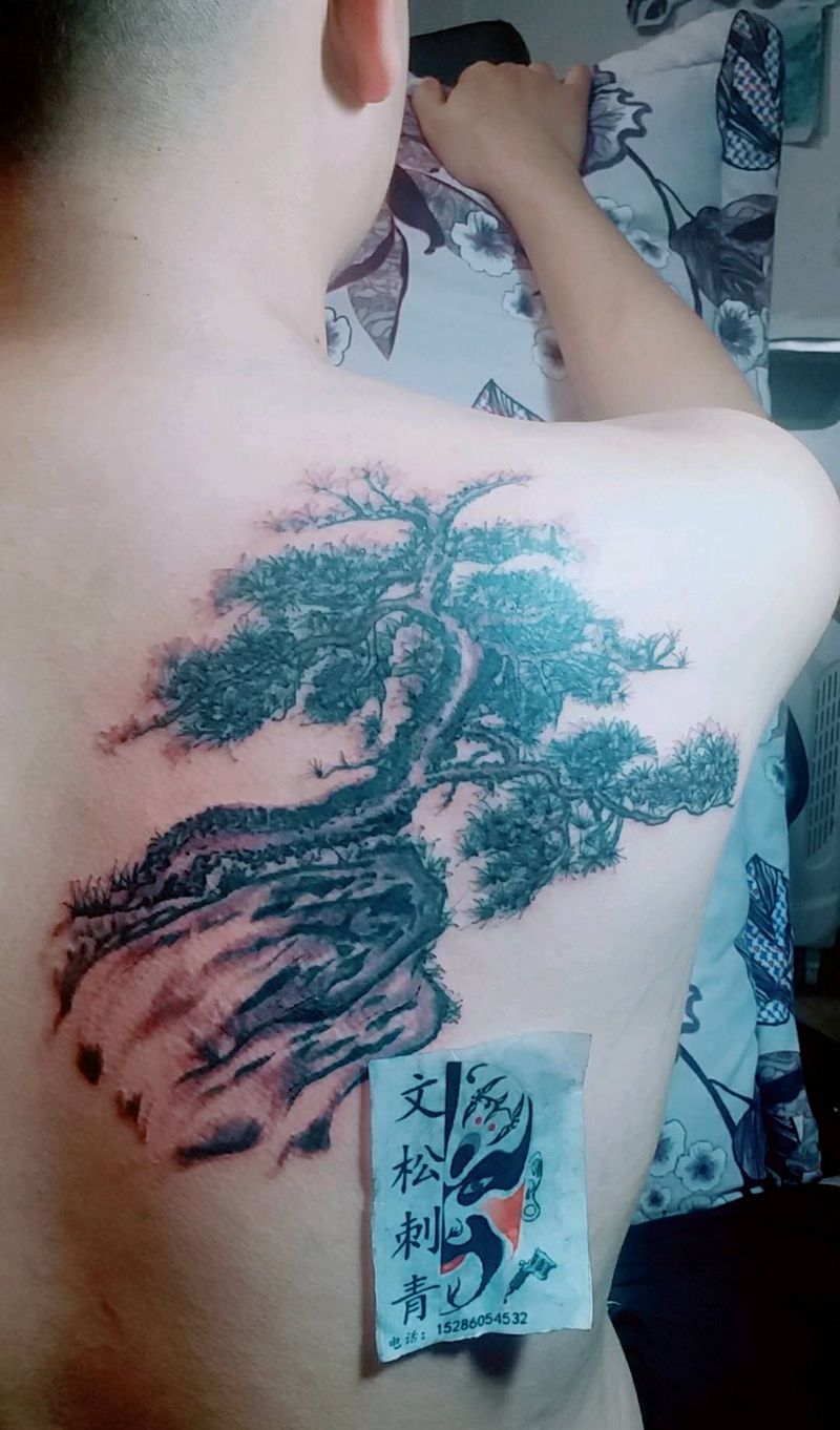 迎客松纹身图片