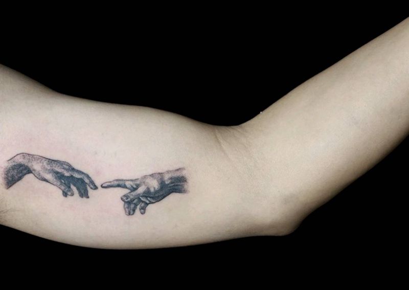 创世纪纹身图片_手臂欧美写实纹身图案