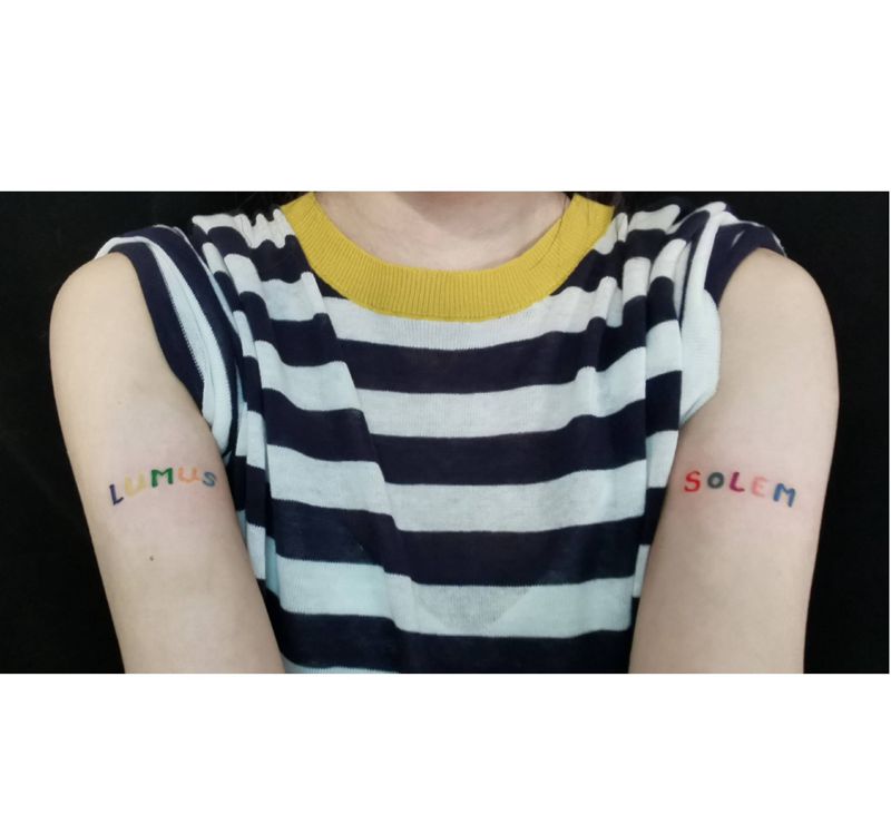 光明咒纹身图片_手臂纹身图案