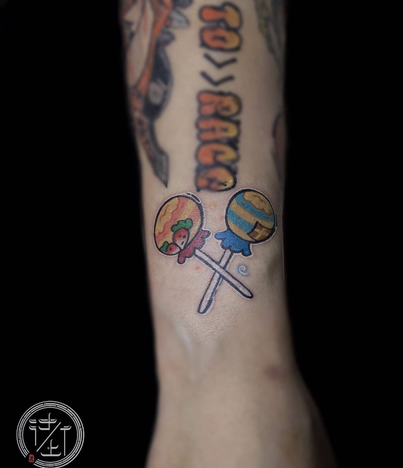 卡通棒棒糖纹身图片_手臂New School卡通纹身图案