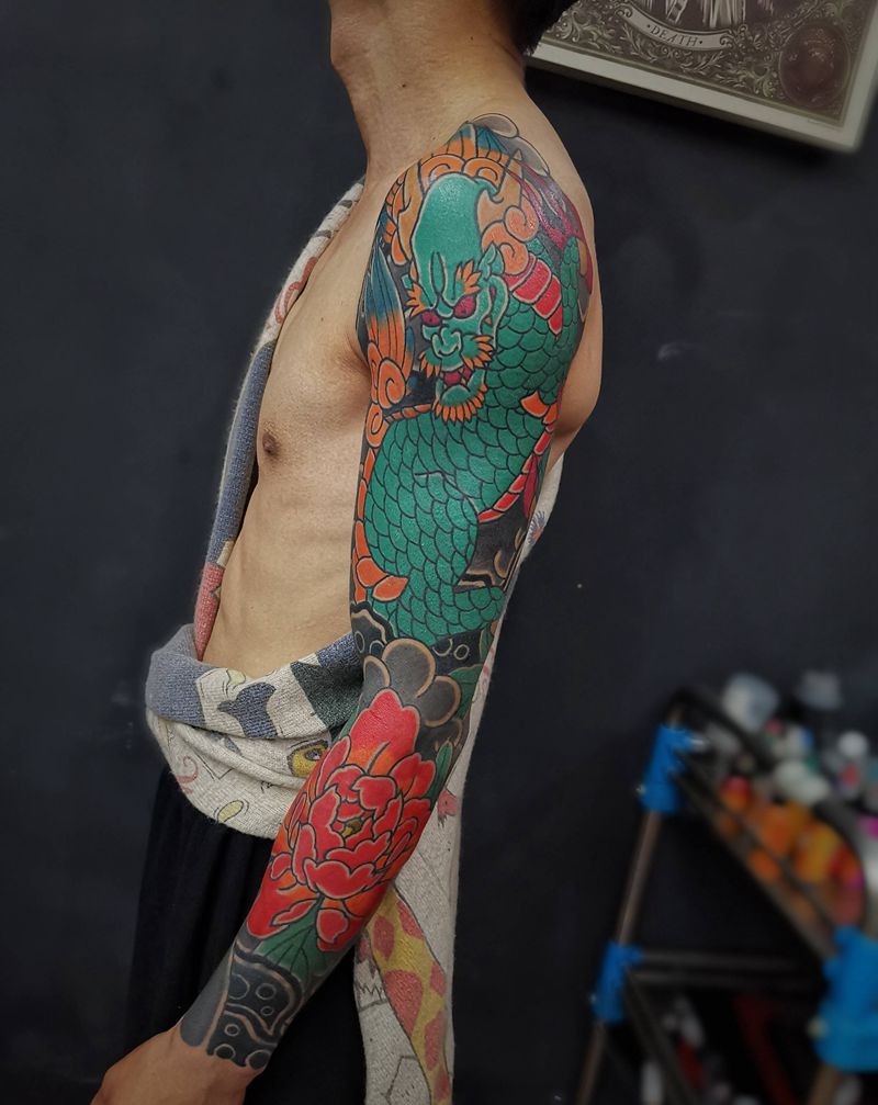 老传统麒麟臂纹身图片_老传统纹身图案