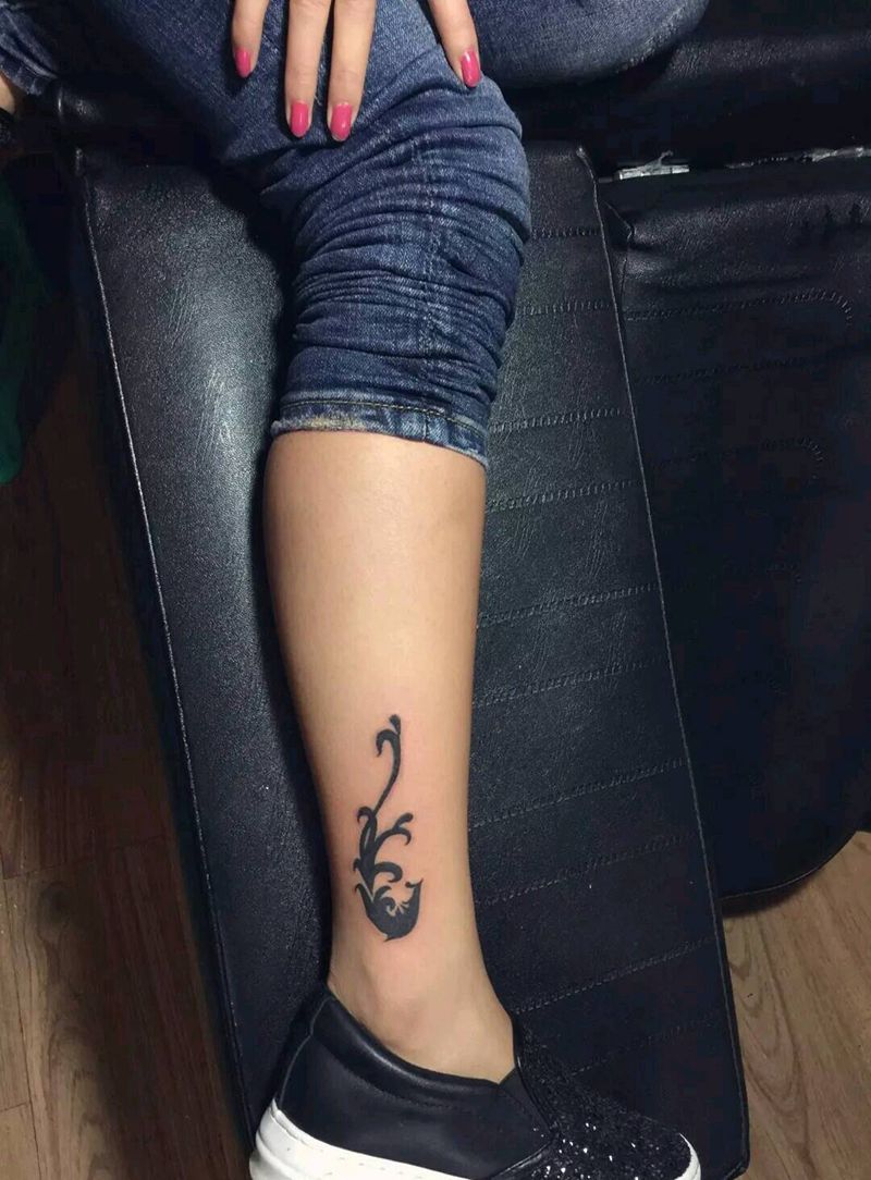 凤凰图腾纹身图片_腿部传统图腾成品纹身图案