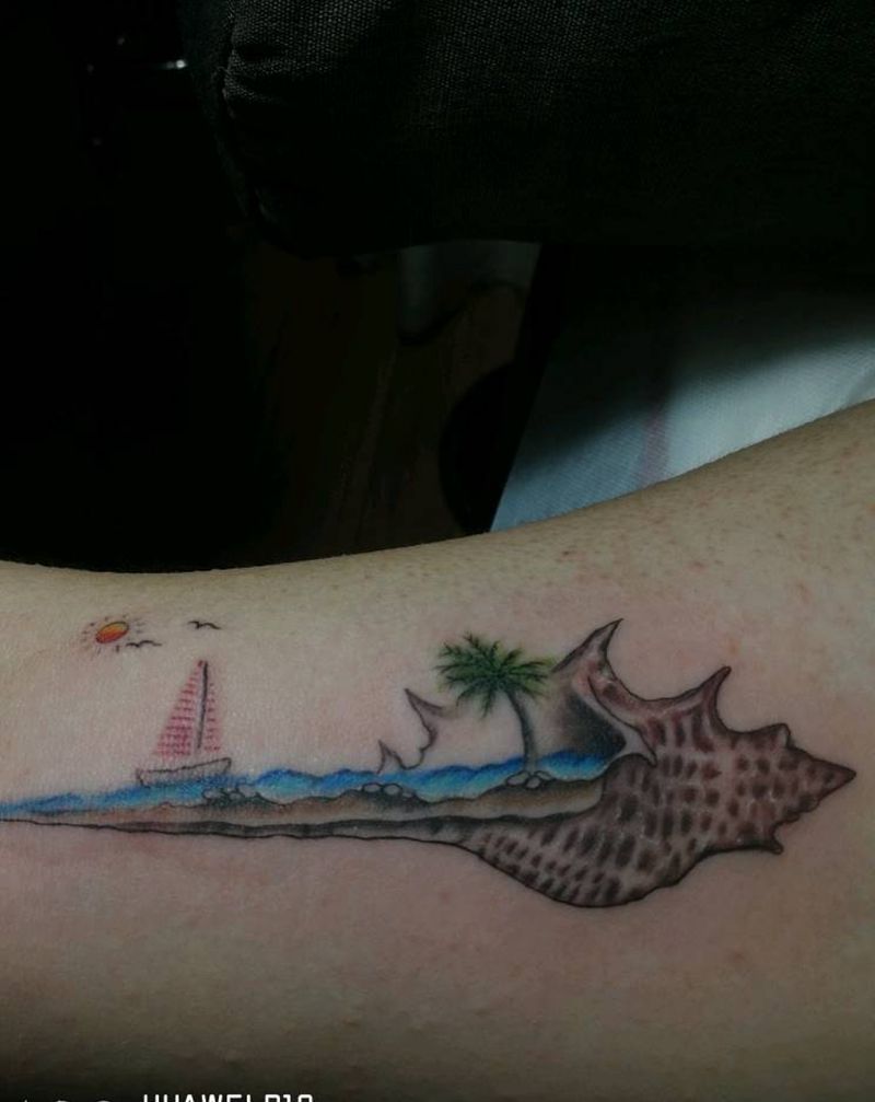 海螺纹身图片_手臂纹身图案