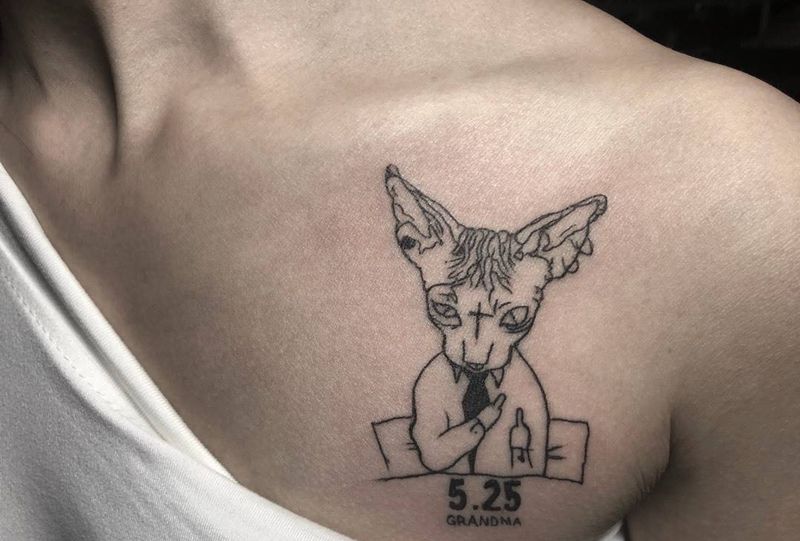 小清新纹身图片_胸部动物字符纹身图案