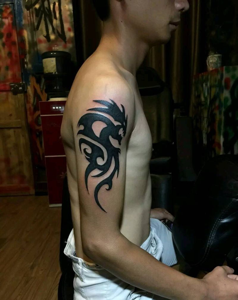 古老的龙图腾纹身图片_手臂传统图腾成品纹身图案