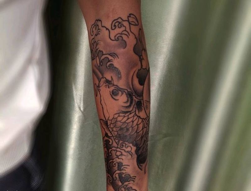 鲤鱼恢复后纹身图片_手臂新传统纹身图案
