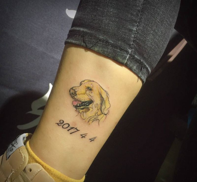 喜欢狗狗的客人纹身图片_手稿成品脚部清新动物纹身图案