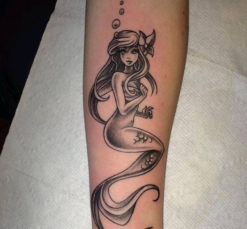 美容鱼纹身图片_手臂纹身图案