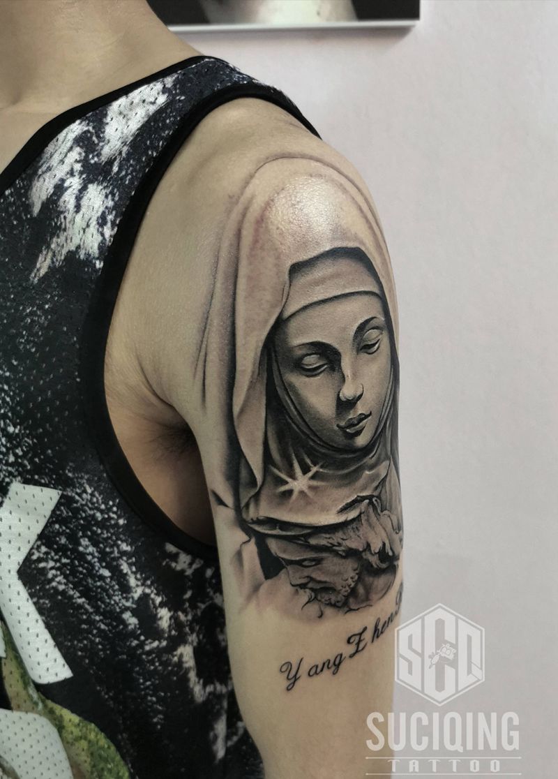 圣母玛利亚纹身图片_手臂腿部欧美写实纹身图案