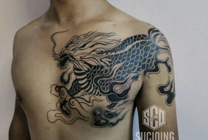 麒麟纹身图片_胸部老传统纹身图案