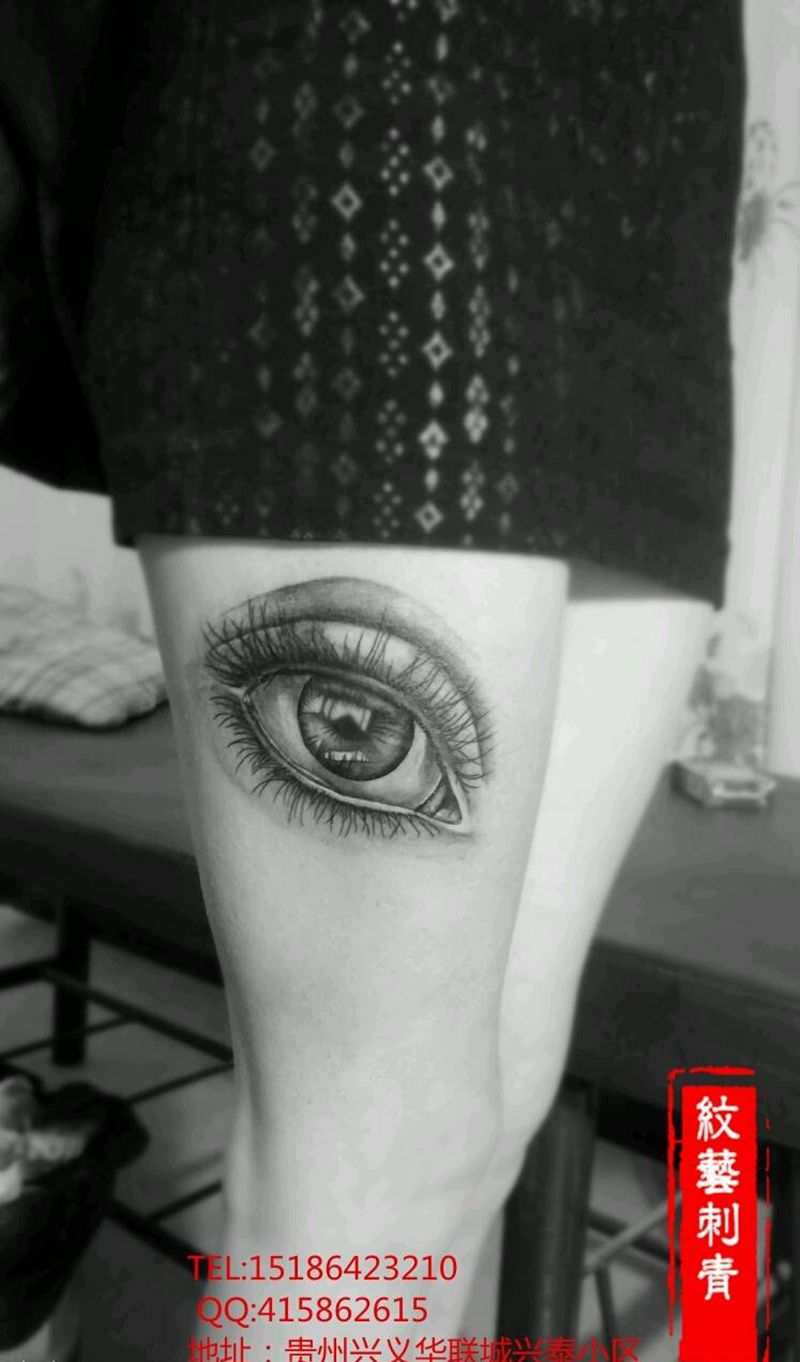 眼睛纹身图片_腿部纹身图案