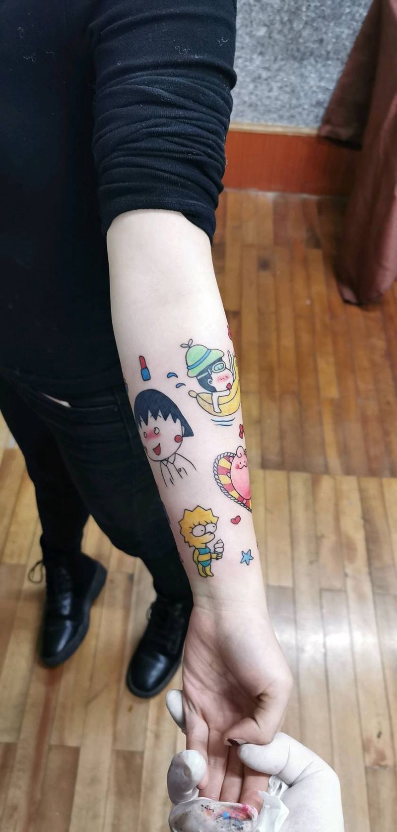 卡通人物纹身图片_手臂手部水彩纹身图案