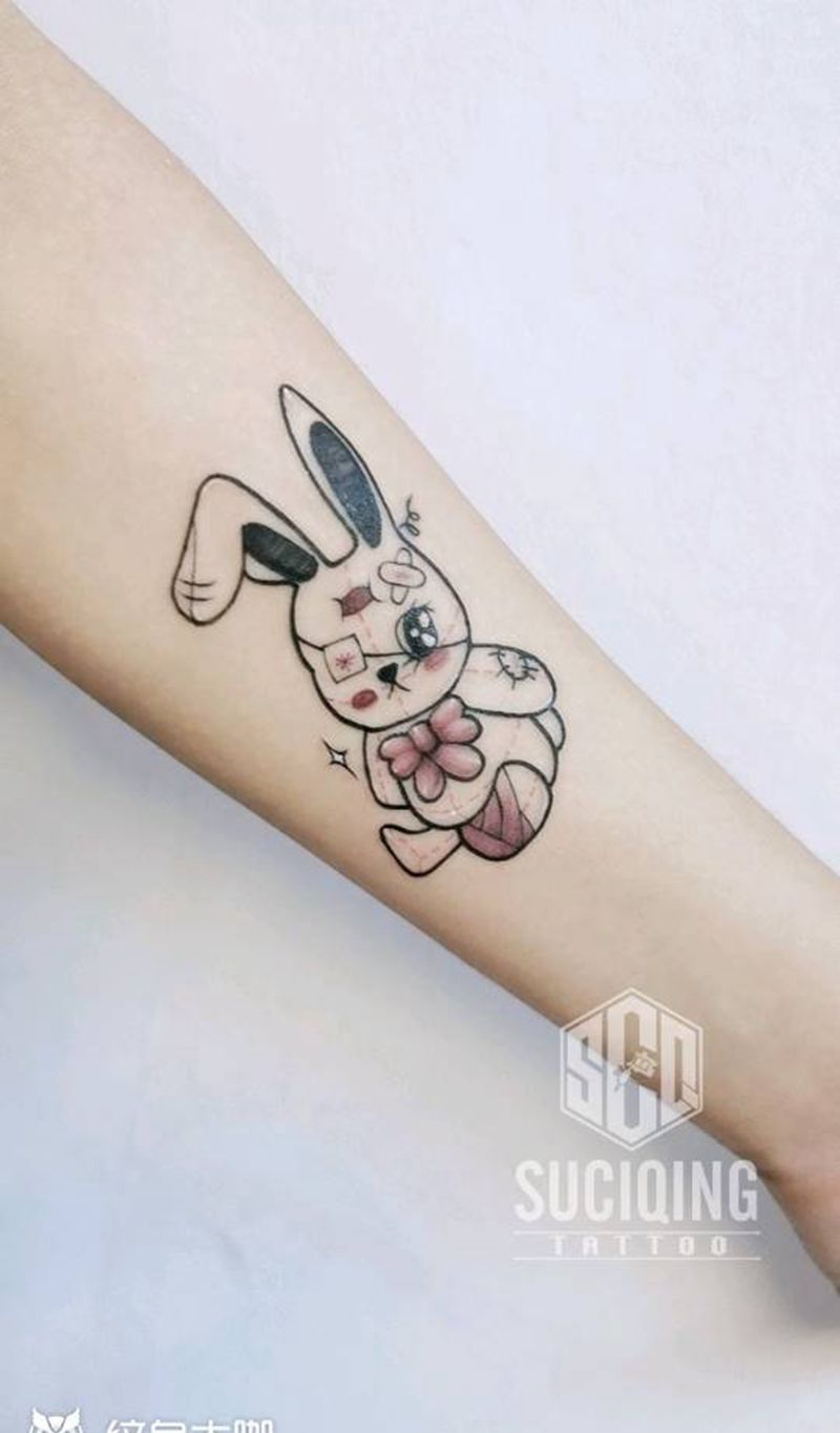 受伤的小白兔纹身图片_手臂手部Old SchoolNew School纹身图案
