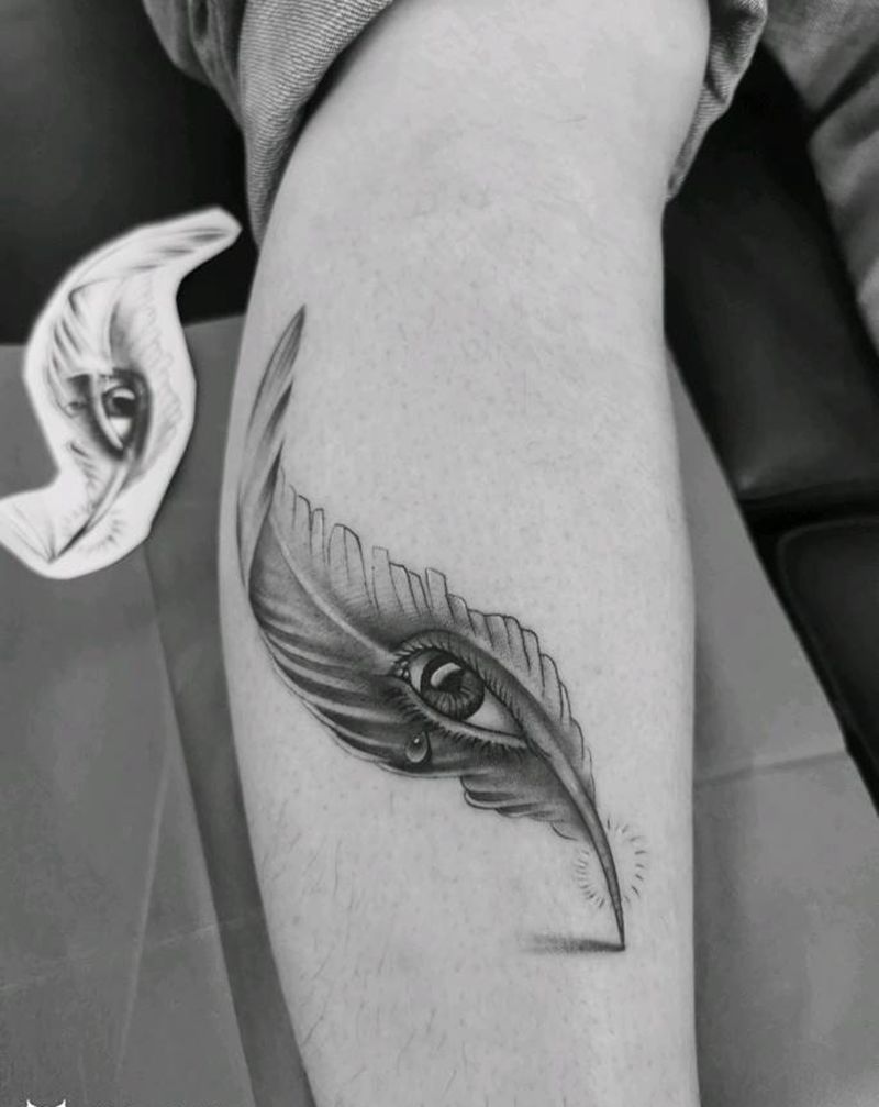 羽毛纹身图片_腿部脚部欧美写实眼睛纹身图案