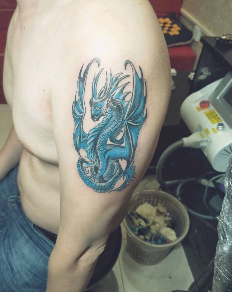 异龙纹身图片_手臂老传统纹身图案