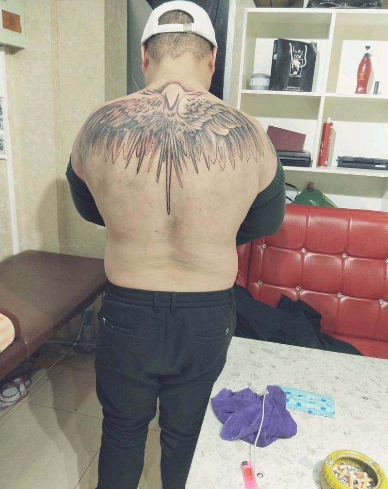 遮盖纹身图片_背部腰部新传统纹身图案