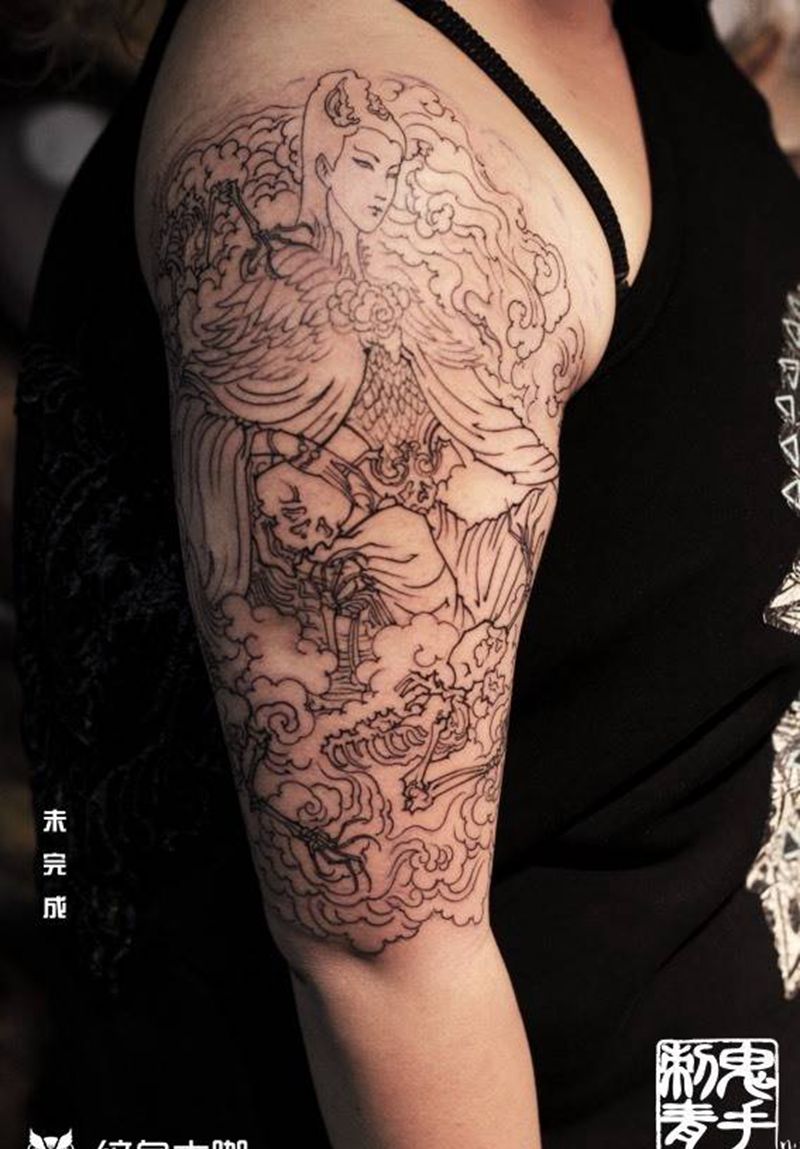 大臂传统白骨精纹身图片_鬼手纹身图案