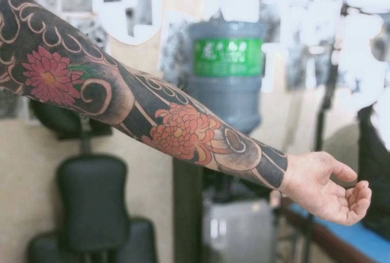 花臂纹身图片_手臂老传统纹身图案