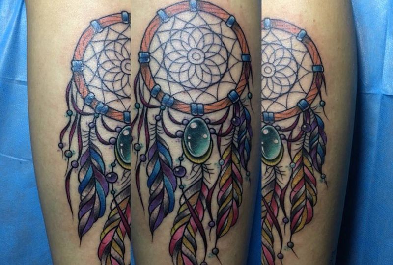 今天扑梦网纹身图片_成品腿部欧美清新扑梦网纹身图案