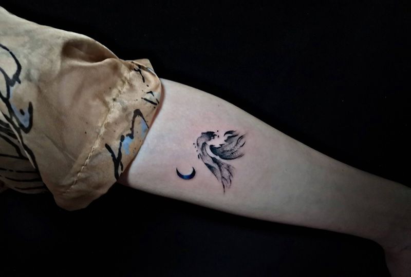 浪花纹身图片_手臂手部水墨纹身图案