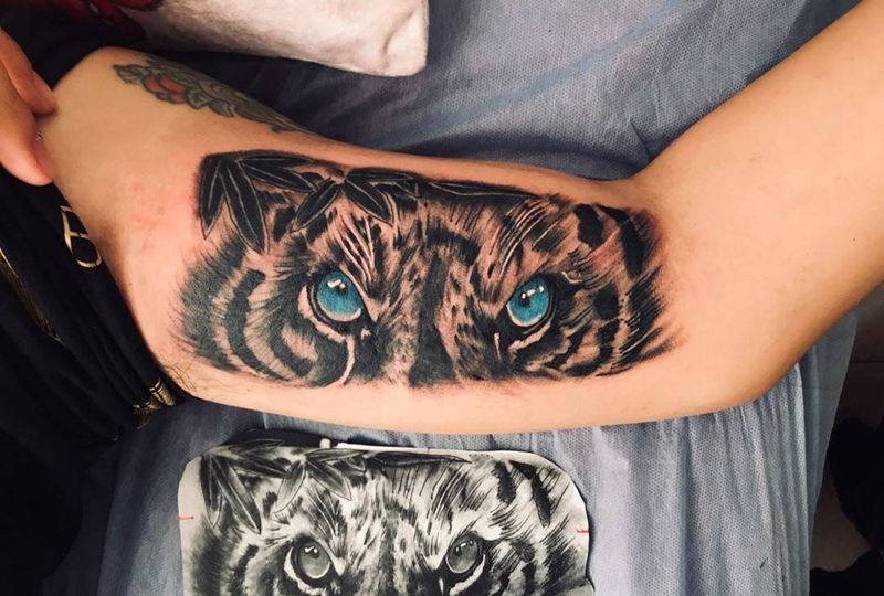 老虎眼睛纹身图片_手臂欧美写实纹身图案