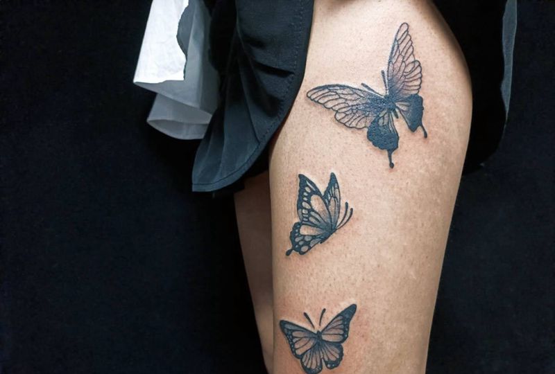 蝴蝶纹身图片_腿部纹身图案