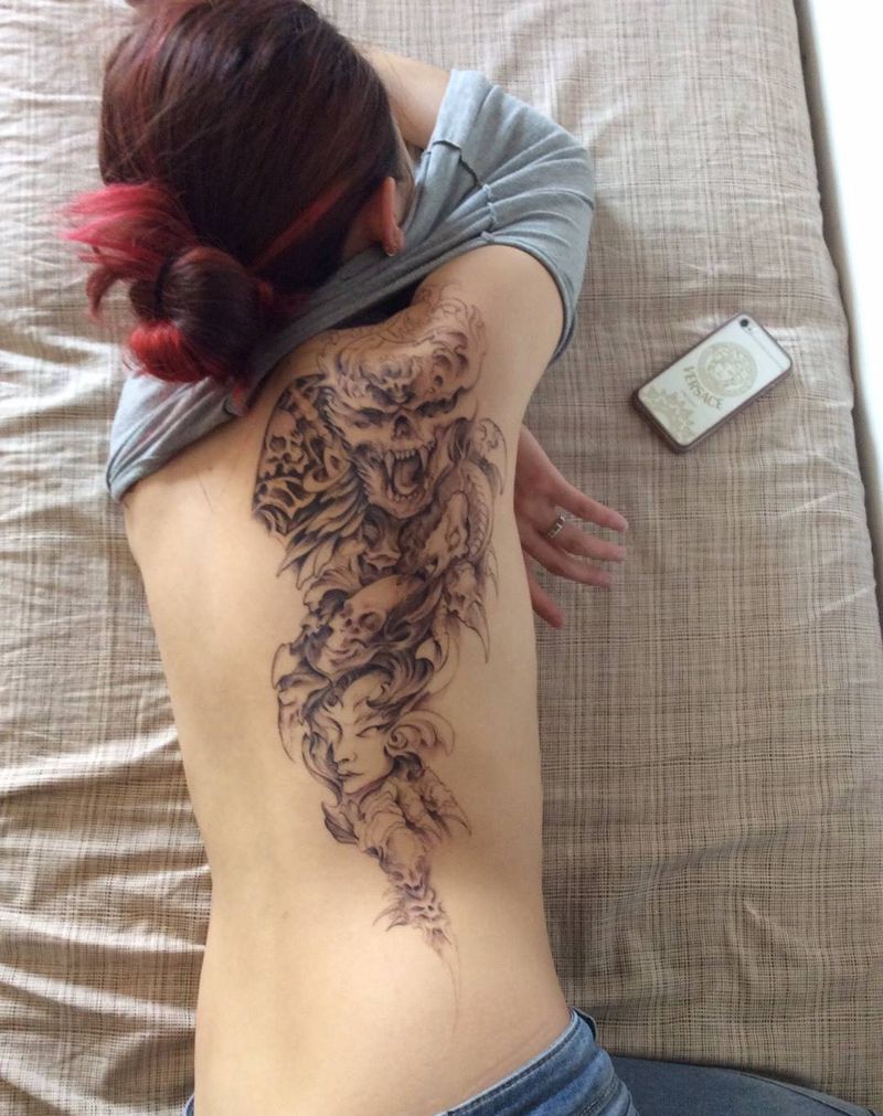 天翼纹身图片_飘逸原创纹身图案