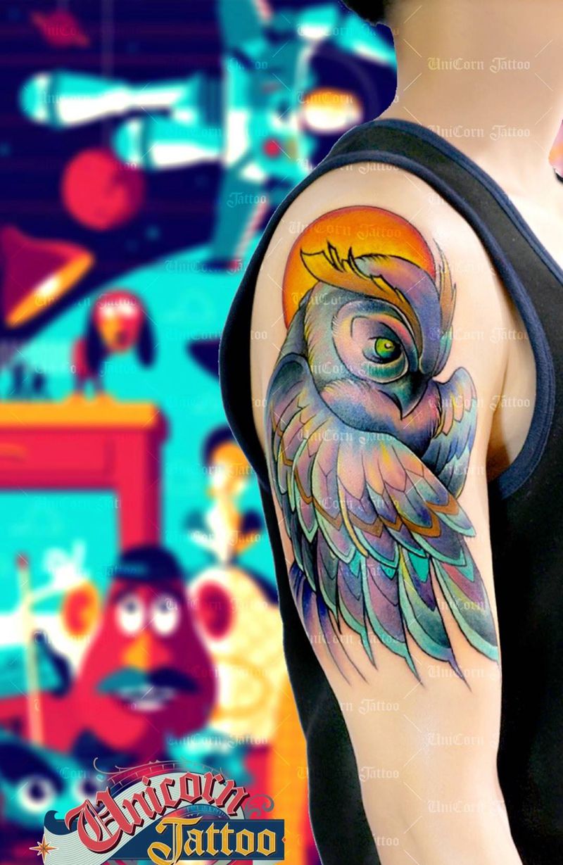 大臂猫头鹰纹身图片