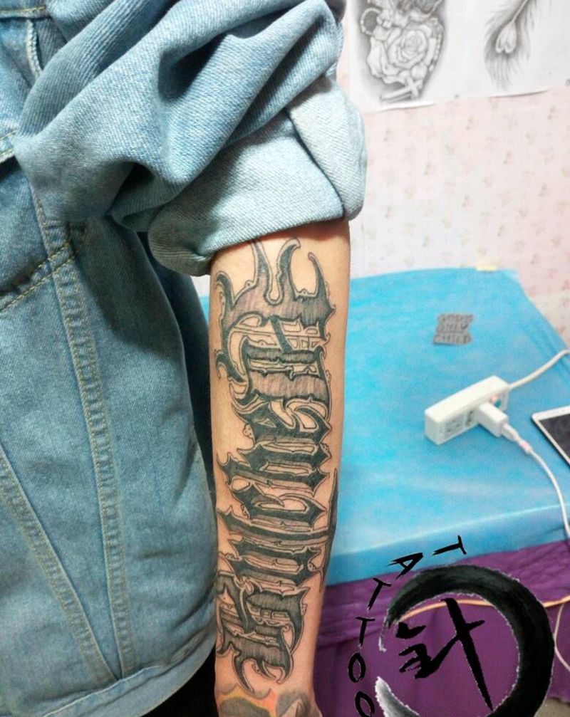 花体纹身图片_手臂欧美字符原创小白刺青塔图~针成品纹身图案