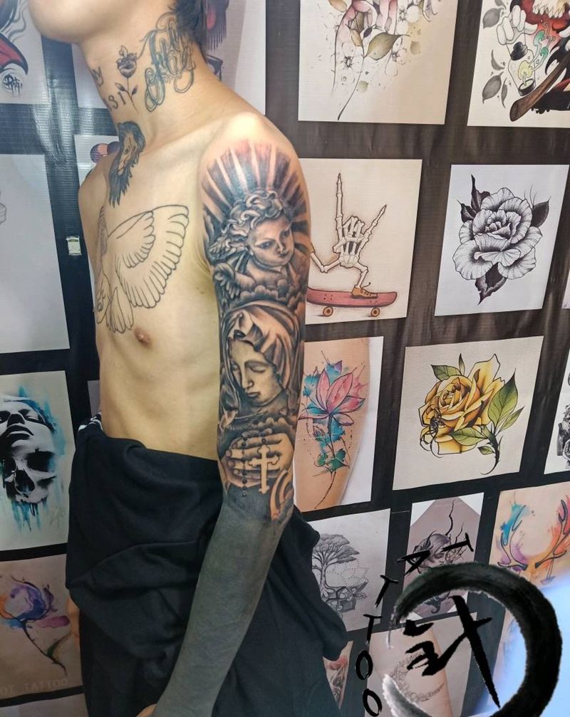 圣母接大臂纹身图片_手臂欧美写实圣母纹身图案