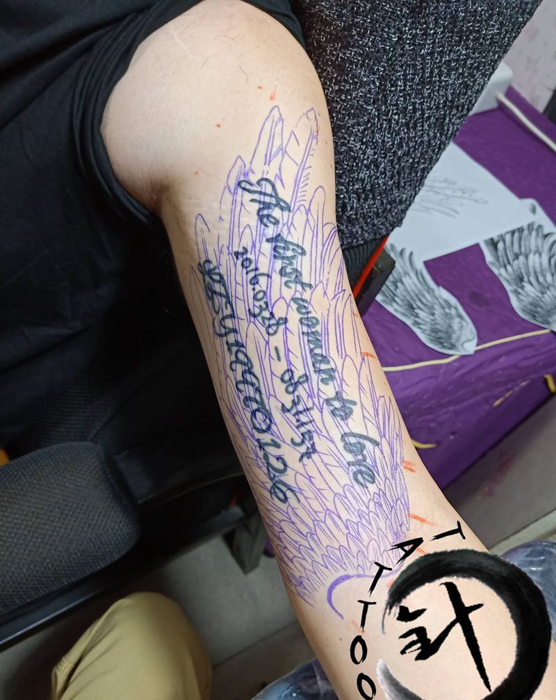 遮盖纹身图片_手臂遮盖羽毛纹身图案