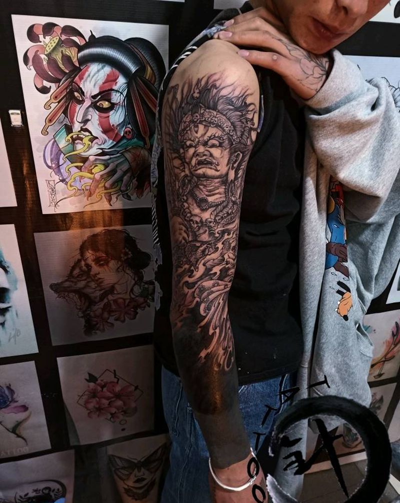 大黑天 黑臂纹身图片_手臂新传统大黑天黑臂纹身图案