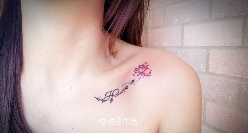 加了朵荷花纹身图片