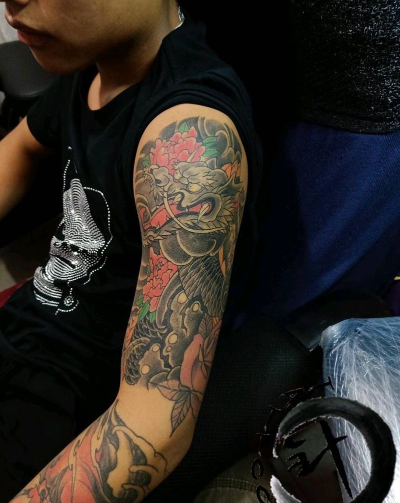 老传统龙恢复后纹身图片_手臂老传统纹身图案